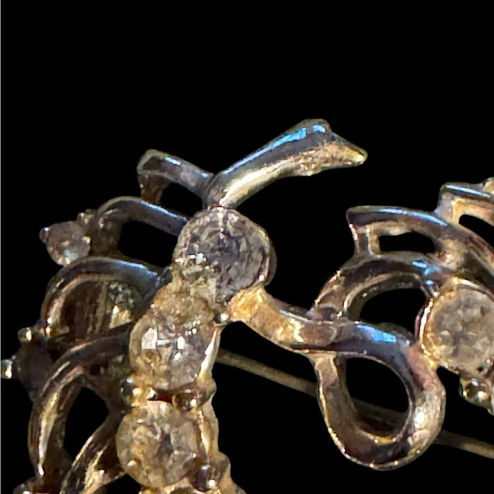 Two crystal brooches